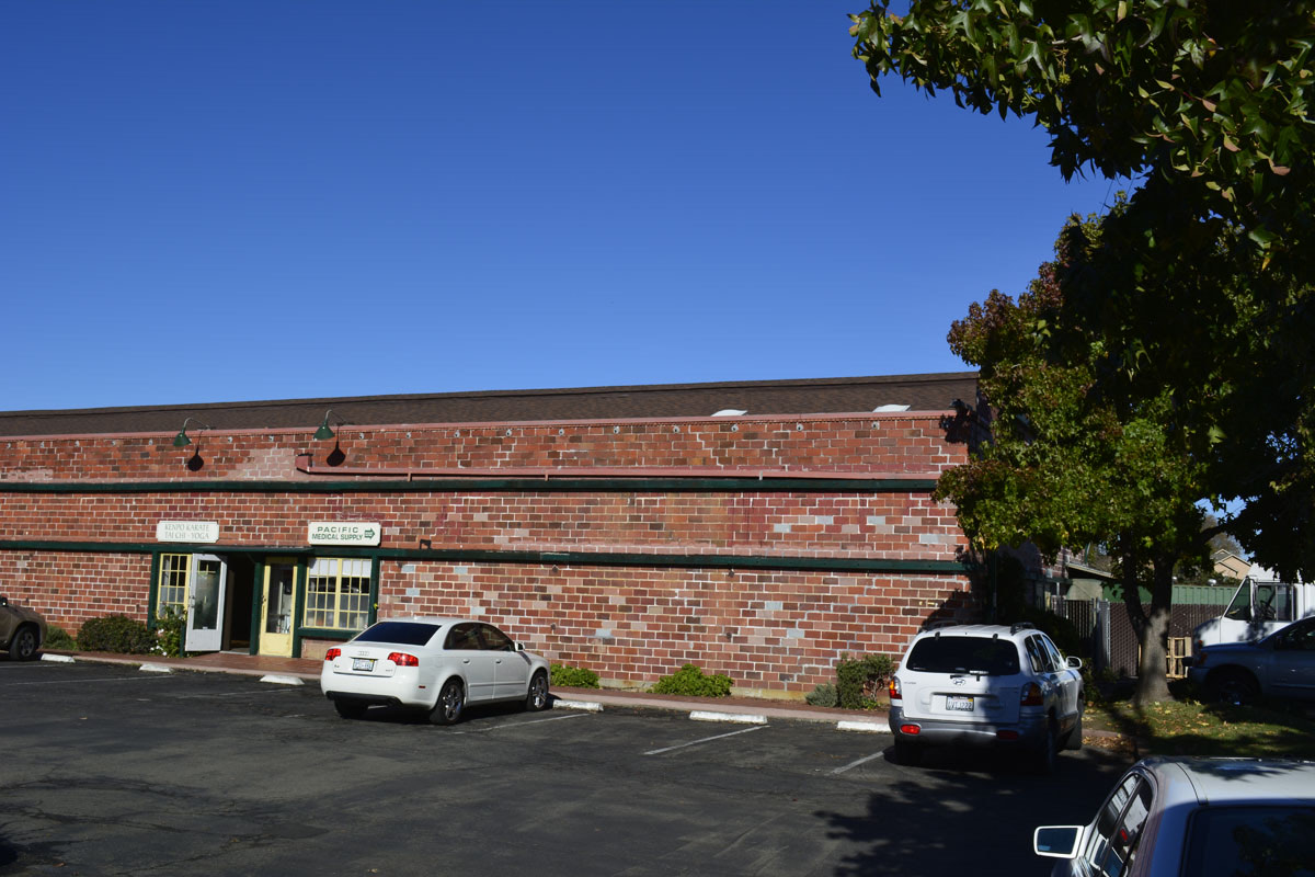 Brick retail storefront roofing