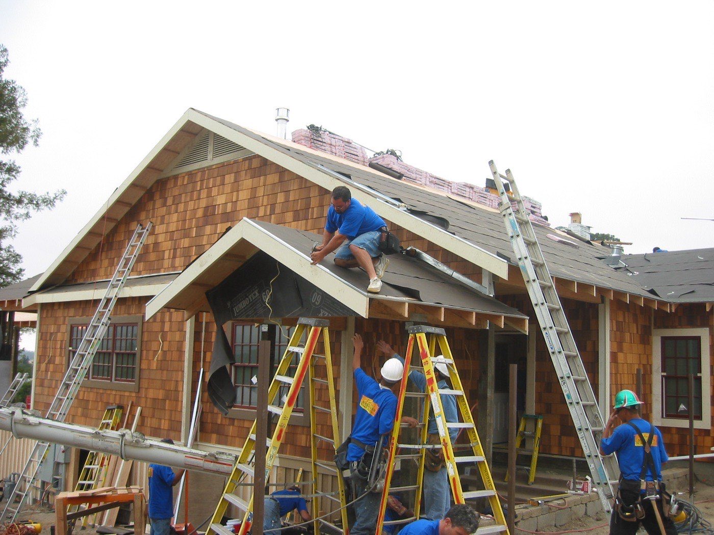 Crew installing shake roof